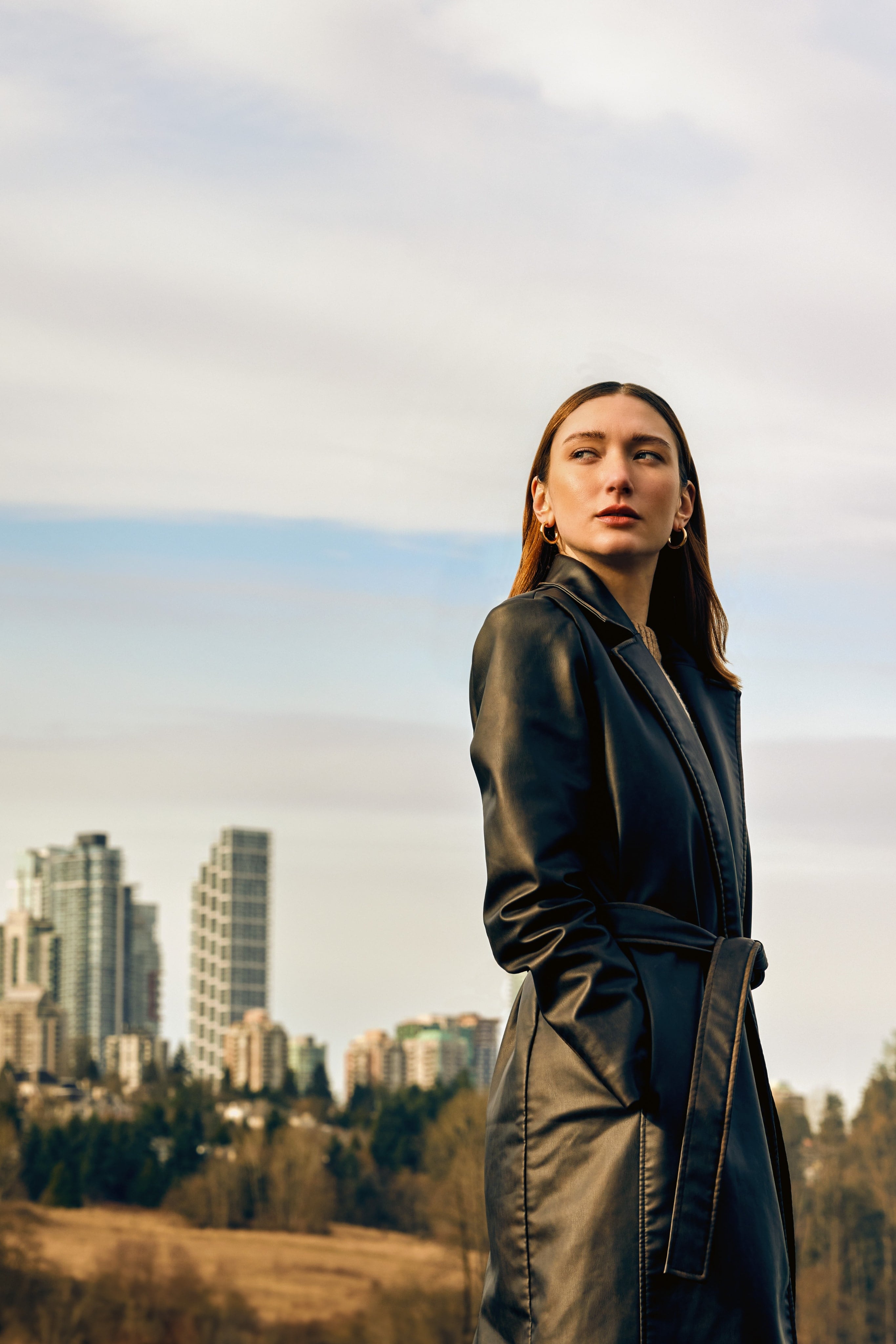 Woman in front of skyline